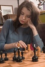 Christy strips naked after losing a game of chess