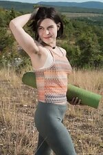 Ole Nina masturbates outdoors doing naked yoga